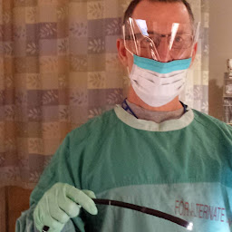 Dr. Kichian in the endoscopy suite at Queensway Carleton Hospital, holding an endoscope
